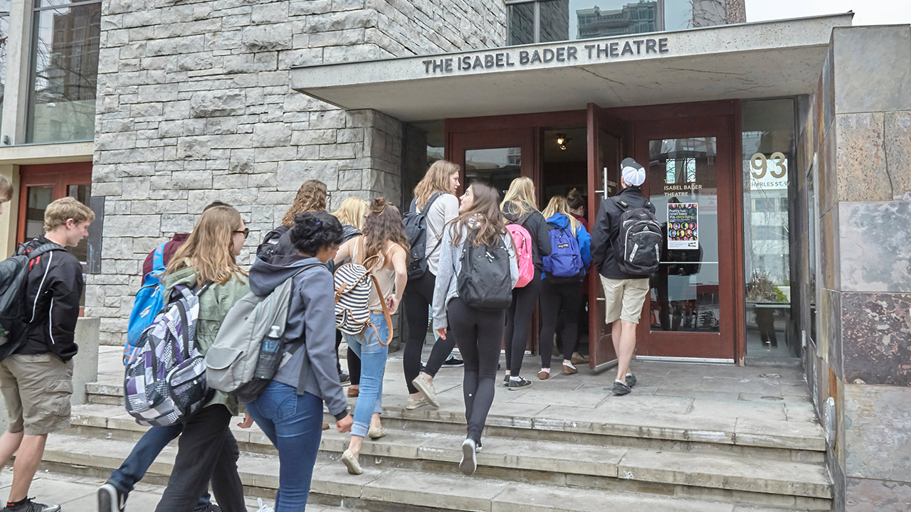 The student audience from all over Toronto arrive at the Isabel Bader Theatre.
