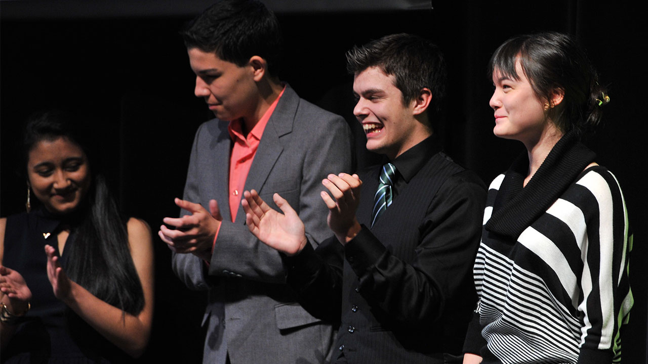 Some National Finalists on stage. (From l. to r.) Pearl Zaki, Peirce Dickson, Colin Fehr, and Samantha Starkey. 